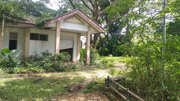 3D rendering of modern high-rise building with glass façade and complex geometric shapes